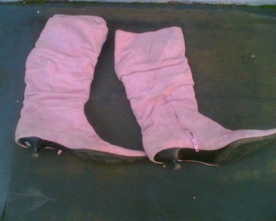 Well worn pink boots